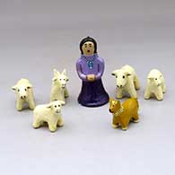 A shepherd with her dog and 4 sheep
 by Elizabeth Manygoats of Dineh