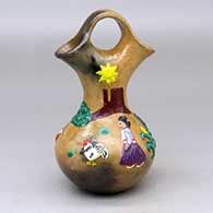 A polychrome Dineh Lifestyle wedding vase
 by Elizabeth Manygoats of Dineh