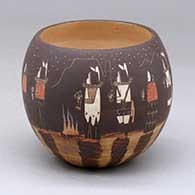 A polychrome cup decorated around the body with a Night Chant Dancer and geometric design
 by Ida Sahmie of Dineh