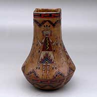 A polychrome square neck jar decorated with a four panel sgraffito and painted yeibichai and geometric design
 by Nancy Yazzie of Dineh