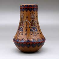 A polychrome low shouldered jar with a tall neck and decorated with a sgraffito and painted yeibichai, feather and geometric design, click or tap to see a larger version