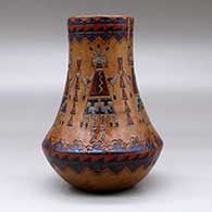 A polychrome low shouldered jar with a tall neck and decorated with a sgraffito and painted yeibichai, feather and geometric design, click or tap to see a larger version