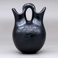 A black on black wedding vase with a two-panel geometric design, click or tap to see a larger version