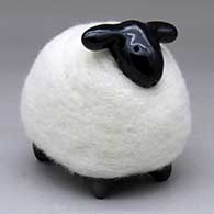 A black sheep figure with a wool body
 by Joe and Eunice Naranjo of Santa Clara