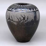 A black-and-sienna jar decorated with a sgraffito elk, mountain lion, nature scene and ring of feathers design
 by Melvin Moquino of Santa Clara