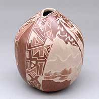 A gourd-shaped sienna jar with an organic opening and decorated with a sgraffito fish, water symbol and geometric design
 by Bernice Naranjo of Taos