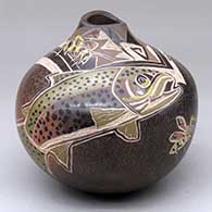 A polychrome jar with an organic opening and decorated with a sgraffito and painted speckled trout, honeybee, dragonfly and geometric design
 by Dusty Naranjo of Santa Clara