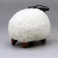 A brown and red sheep figure with a full coat of wool, click or tap to see a larger version
