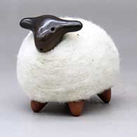 A brown and red sheep figure with a full coat of wool, click or tap to see a larger version