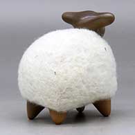 A brown sheep figure with a full coat of wool, click or tap to see a larger version