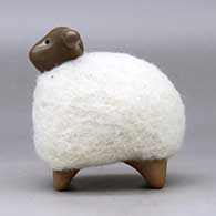 A brown sheep figure with a full coat of wool, click or tap to see a larger version