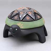 A polychrome turtle figure decorated with a carved geometric design and a sgraffito and sienna hummingbird, flower and geometric design with inlaid stones
 by Melony Gutierrez of Santa Clara