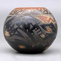 A black bowl with a sienna rim and spots decorated around with a sgraffito avanyu, bear paw and geometric design, plus an inlaid stone, click or tap to see a larger version