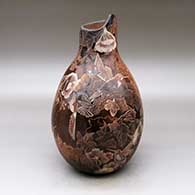 Click for a larger view A sepia jar with an organic opening and decorated with a sgraffito hummingbird, branch, leaf and flower design
by Bernice Naranjo of Taos
