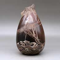 A brown jar with an organic opening, an applique fold and decorated with a sgraffito sea serpent, ocean wave and geometric design, click or tap to see a larger version