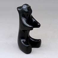 A polished black bear figure sitting up
 by Jarren Naranjo of Santa Clara