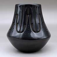 A tall neck black jar decorated with a carved kiva step and geometric design around the neck, click or tap to see a larger version