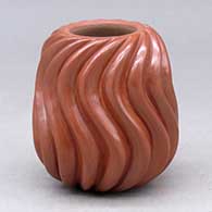 A red melon jar carved with 16 ribs
 by Nancy Youngblood of Santa Clara