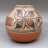 Polychrome jar with a traditional Kewa design featuring bird, flower, and geometric elements, click or tap to see a larger version