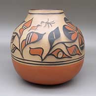 Polychrome jar with a traditional Kewa design featuring bird, flower, and geometric elements, click or tap to see a larger version