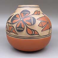 Polychrome jar with a traditional Kewa design featuring bird, flower, and geometric elements, click or tap to see a larger version