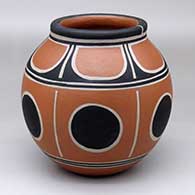 A polychrome jar with two bands of six-panel geometric design
 by Thomas Tenorio of Santo Domingo