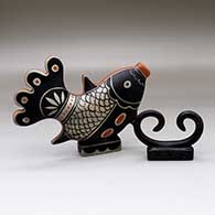 A two-piece polychrome Fish out of Water set
 by Thomas Tenorio of Santo Domingo