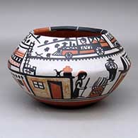 A polychrome bowl decorated with a train and pueblo scene
 by Robert Tenorio of Santo Domingo