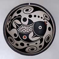 Click for a larger view A polychrome chili bowl decorated with a fish and water symbol geometric design inside, and a water symbol geometric design outside
by Thomas Tenorio of Santo Domingo