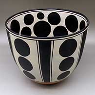 A polychrome hair washing bowl decorated inside and out with a geometric design
 by Thomas Tenorio of Santo Domingo