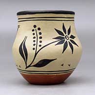 A polychrome jar decorated with a bird, plant and American flag design, click or tap to see a larger version