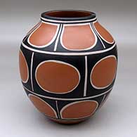 A polychrome jar decorated with bands of geometric design
 by Thomas Tenorio of Santo Domingo