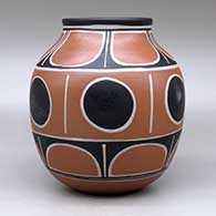 A polychrome jar decorated with bands of geometric design, click or tap to see a larger version