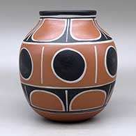 A polychrome jar decorated with bands of geometric design, click or tap to see a larger version