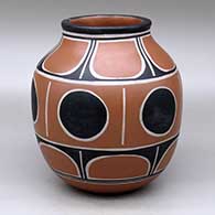 A polychrome jar decorated with bands of geometric design
 by Thomas Tenorio of Santo Domingo
