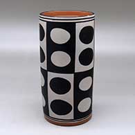 A polychrome cylinder decorated with a six-panel geometric design
 by Thomas Tenorio of Santo Domingo