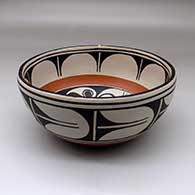 A large chile bowl decorated inside with a bird, plant and geometric design, and outside with a geometric design
 by Thomas Tenorio of Santo Domingo