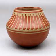 Click for a larger view A buff on red jar decorated with a band of feathers design above the shoulder
by Blue Corn of San Ildefonso