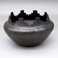 A black micaceous prayer bowl with six altars
 by Angie Yazzie of Taos