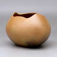 A golden micaceous pot with an organic opening and fire clouds, click or tap to see a larger version