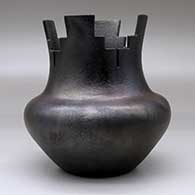 A black micaceous prayer jar with fire clouds, click or tap to see a larger version