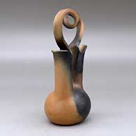 A golden micaceous wedding vase with a looped bridge and fire clouds, click or tap to see a larger version