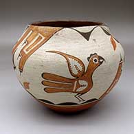 A polychrome jar decorated with a two-panel parrot, cloud and geometric design
 by Seferina Bell of Zia