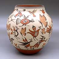 A large polychrome jar decorated with images of birds, butterflies, dragonflies, flowers and flying insects
 by Marcellus Medina of Zia