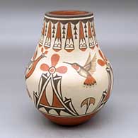 A tall neck polychrome jar decorated with a two-panel hummingbird, roadrunner, flower and geometric design
 by Marcellus Medina of Zia