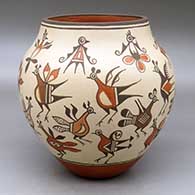 A polychrome jar decorated with images of birds from throughout Zia pottery history
 by Marcellus Medina of Zia