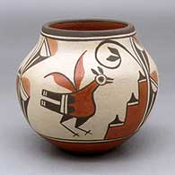 A polychrome jar decorated with a three panel roadrunner, rain cloud and geometric design
 by Elizabeth Medina of Zia