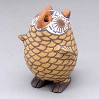 A standing polychrome owl figure
 by Erma Homer of Zuni