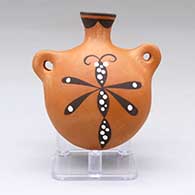 A small polychrome canteen with handles and decorated with a dragonfly and geometric design
 by Chris Nahohai of Zuni