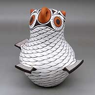 A polychrome owl figure
 by Anderson Jamie Peynetsa of Zuni